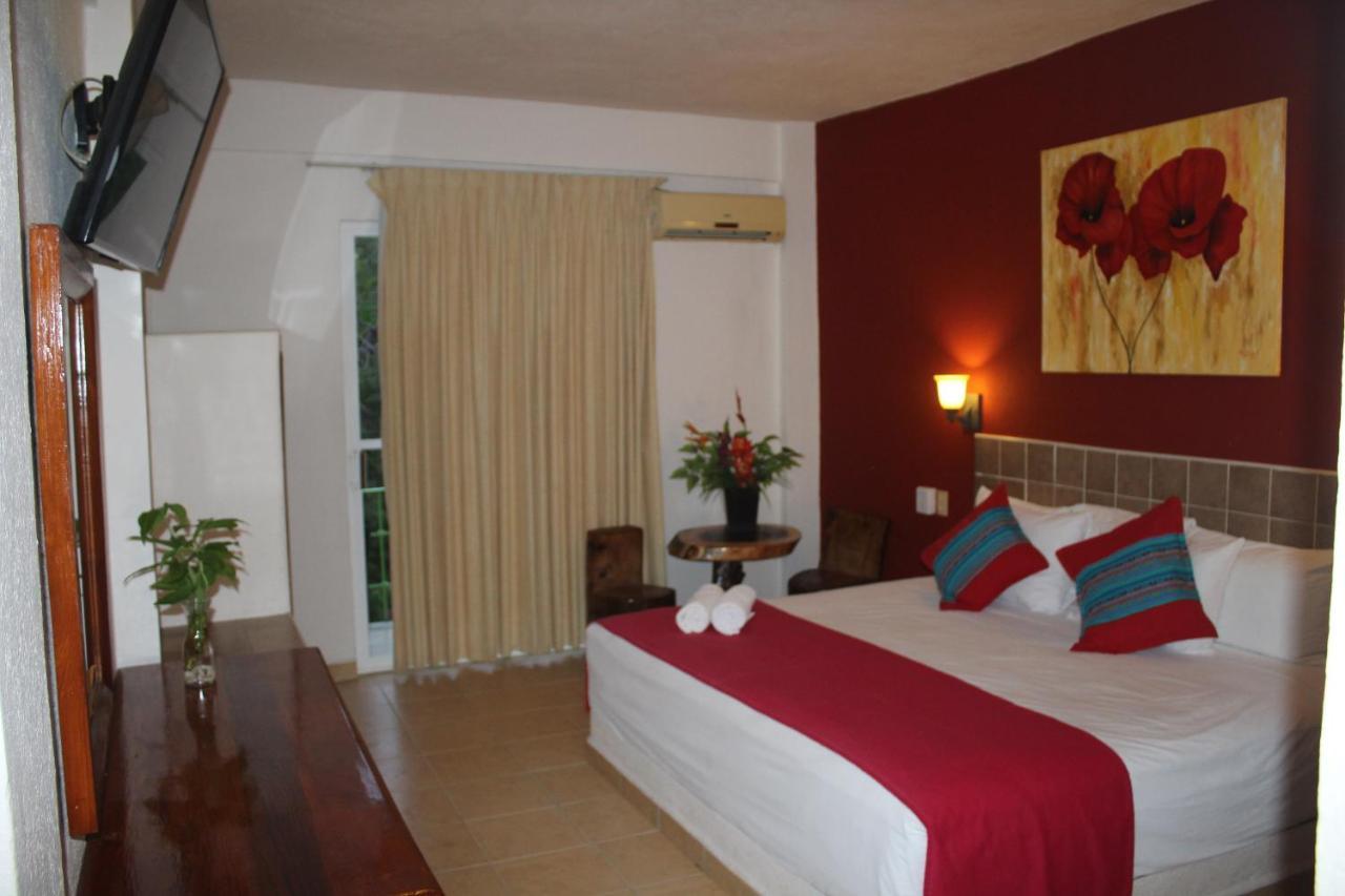Hotel Arenas Del Pacifico Санта-Крус-Хуатулко Экстерьер фото