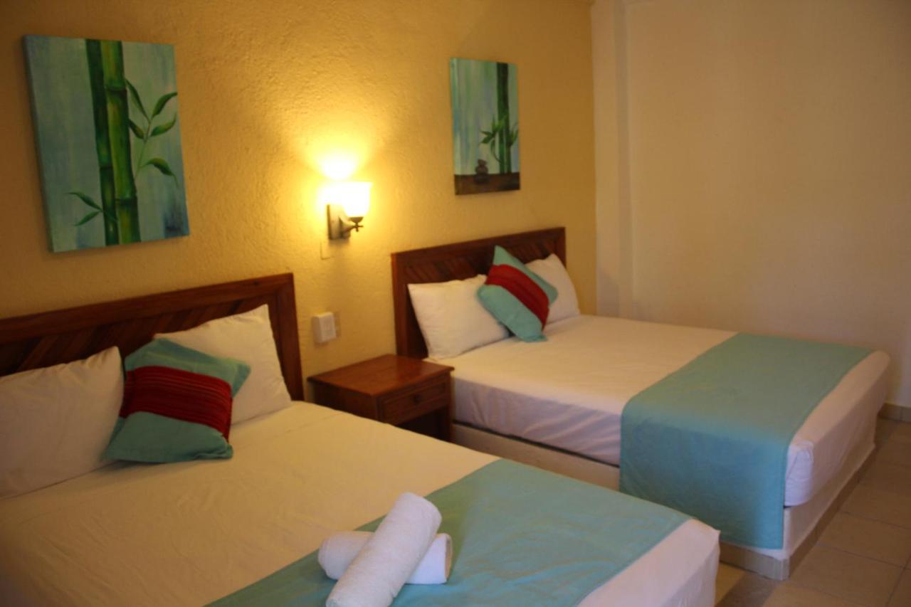 Hotel Arenas Del Pacifico Санта-Крус-Хуатулко Экстерьер фото
