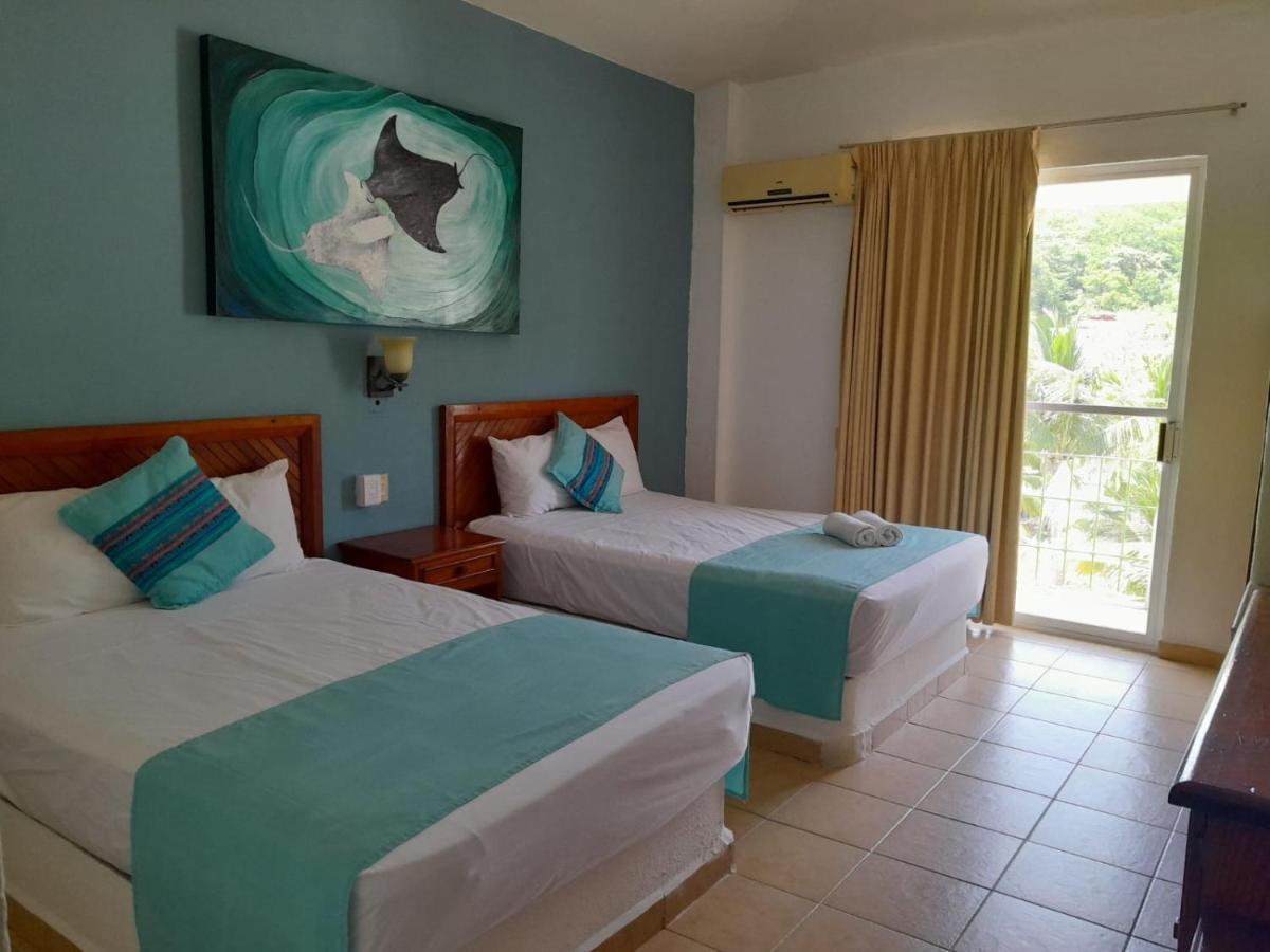 Hotel Arenas Del Pacifico Санта-Крус-Хуатулко Экстерьер фото