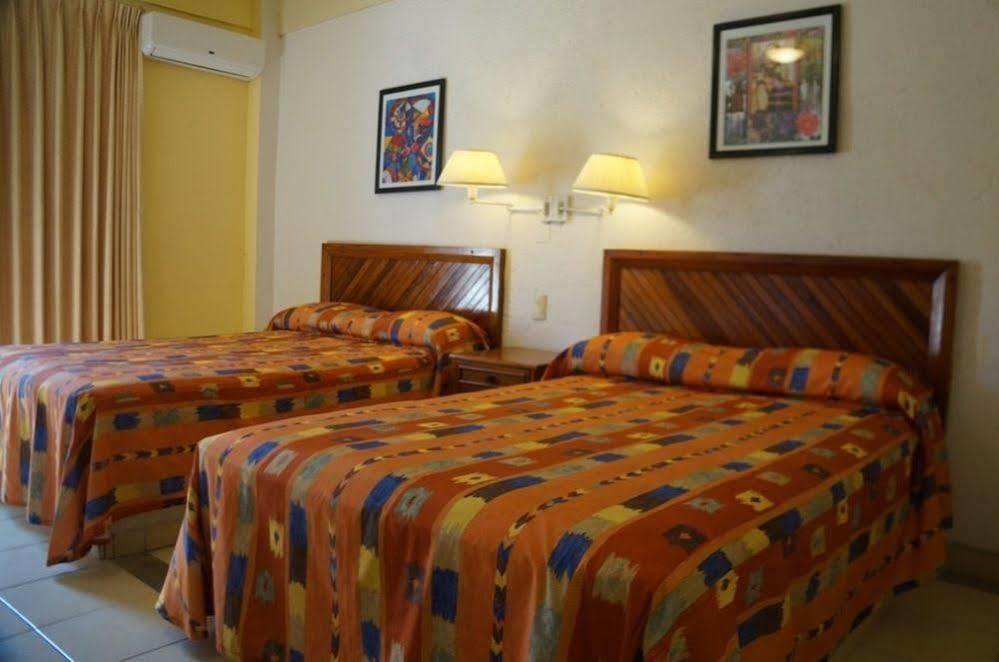 Hotel Arenas Del Pacifico Санта-Крус-Хуатулко Экстерьер фото