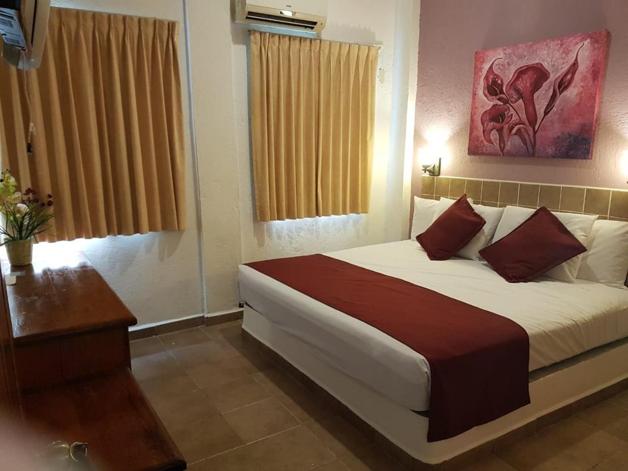 Hotel Arenas Del Pacifico Санта-Крус-Хуатулко Экстерьер фото