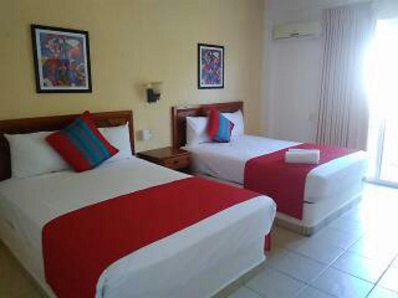Hotel Arenas Del Pacifico Санта-Крус-Хуатулко Экстерьер фото